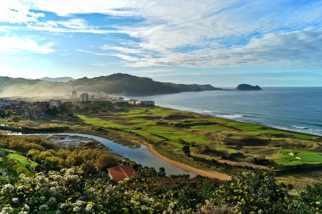 Basque town Zarautz with beach, golf course and mountains