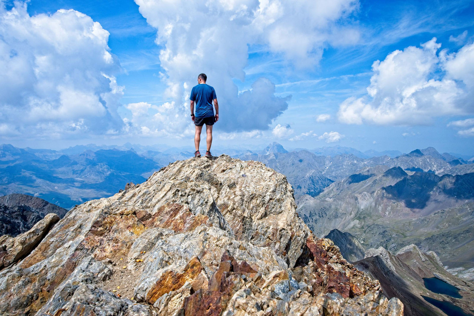 Man on summit of Garmo Negro