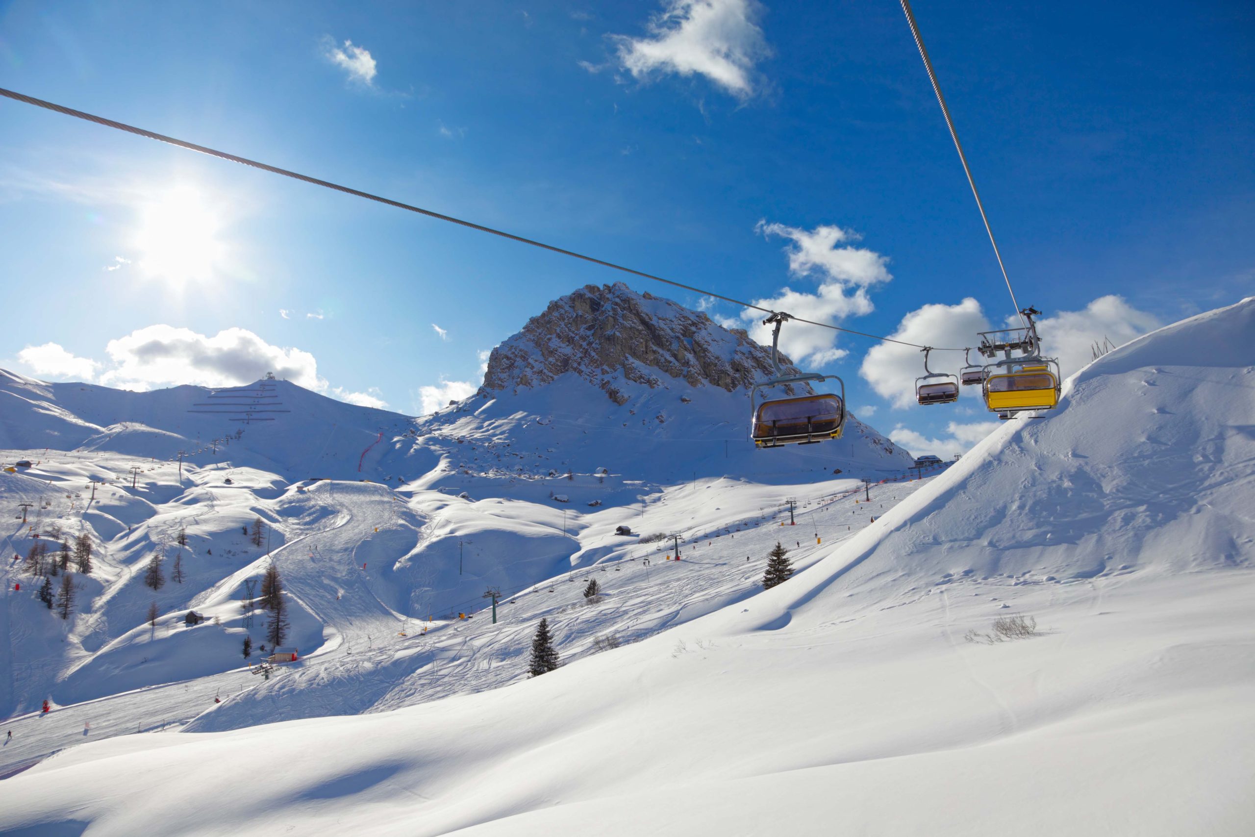 A landscape of ski slopes during the day