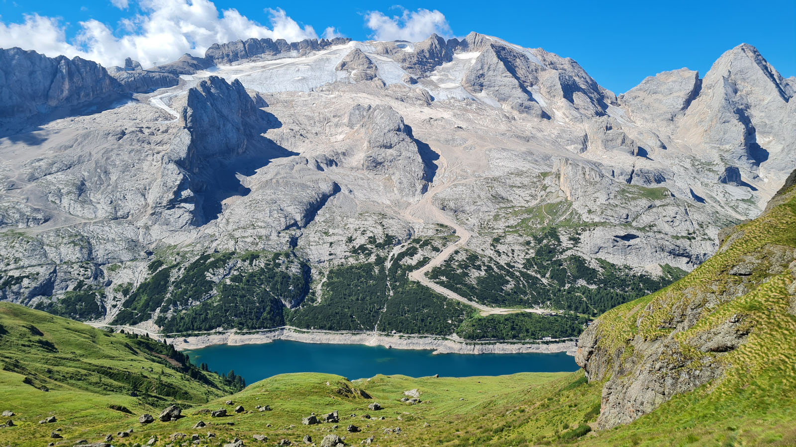 marmolada mountain with glacier and mountain lake