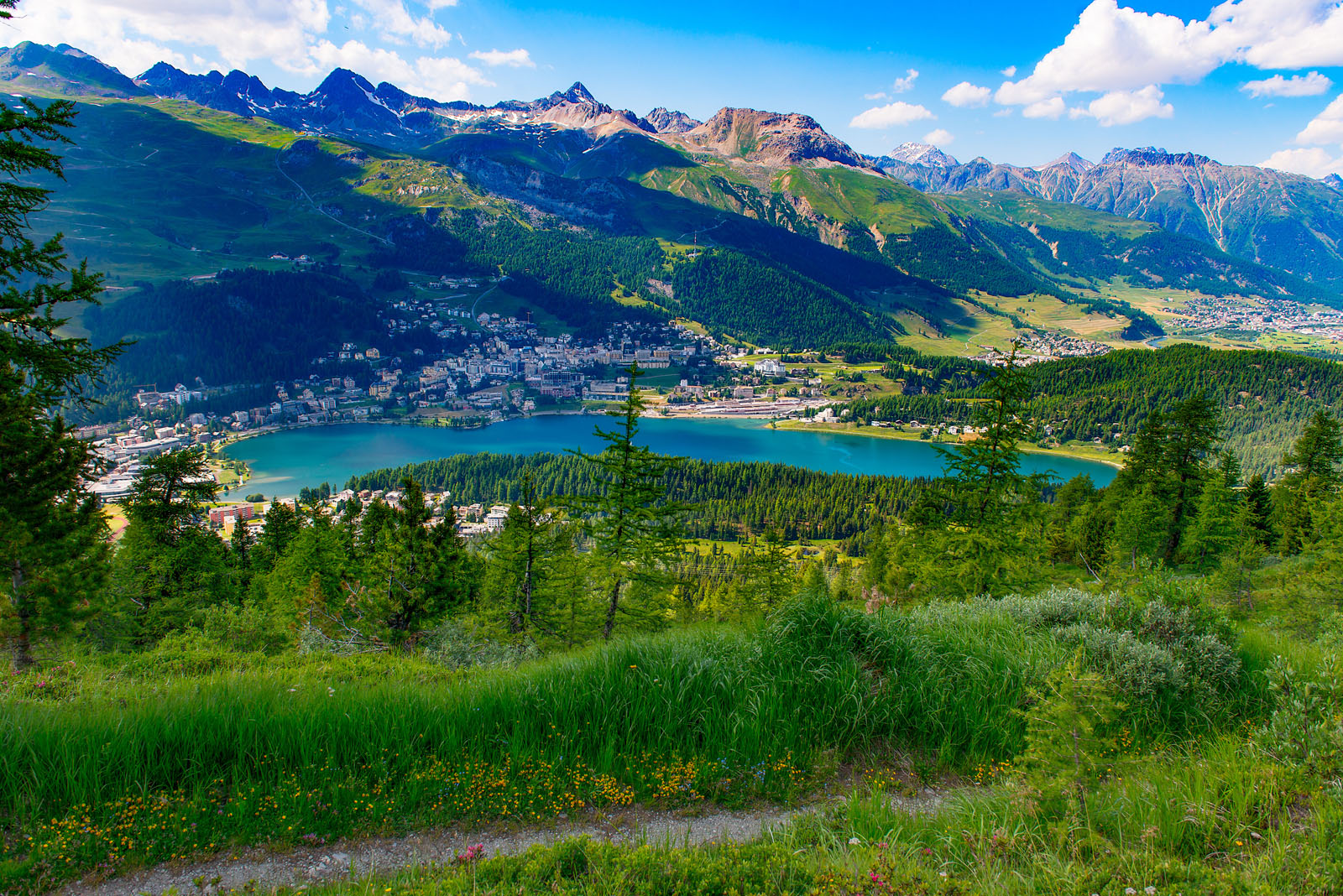 View of St. Moritz from a mountain trail in summer